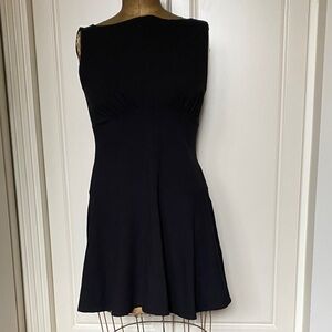 Reformation Elegant Black mini  Dress.